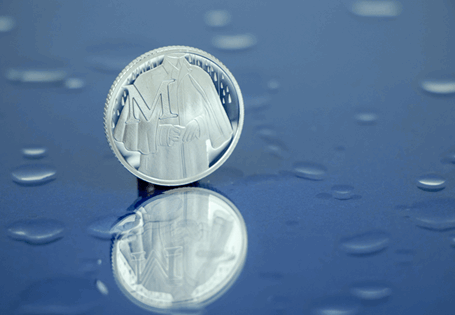 This Silver 10p has been struck by The Royal Mint to celebrate Great Britain. It features the letter 'M' and represents the Macintosh. This 10p comes presented in an acrylic block.