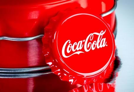 This Silver Coca-Cola Bottle Cap is an actual size bottle cap. Made from Pure Silver it features the iconic Coca-Cola logo. The coin is packaged in a branded tin with a certificate of authenticity. 