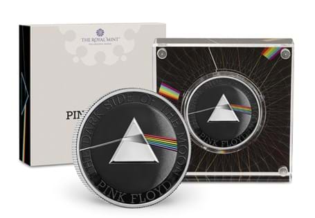 This 2026 dated UK Silver Proof 1oz coin has been issued by The Royal Mint to celebrate the iconic rock band Pink Floyd, depicting the iconic prism from The Dark Side of the Moon. 