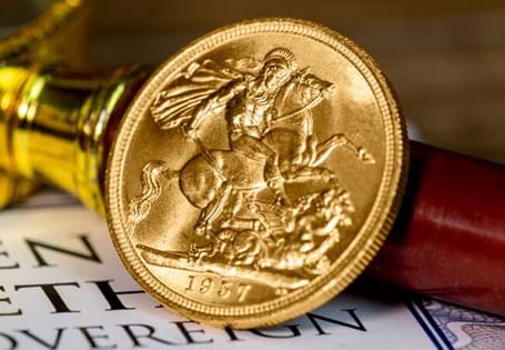 This Queen Elizabeth II Gillick portrait Gold Sovereign was struck in 1957. The reverse features Pistrucci's St George and the Dragon. Stuck in 22 carat gold.
